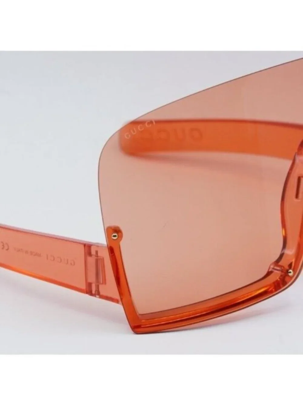 Gucci GG1631S 001 Sunglasses Transparent Red Shield Frame, Light Red Lenses